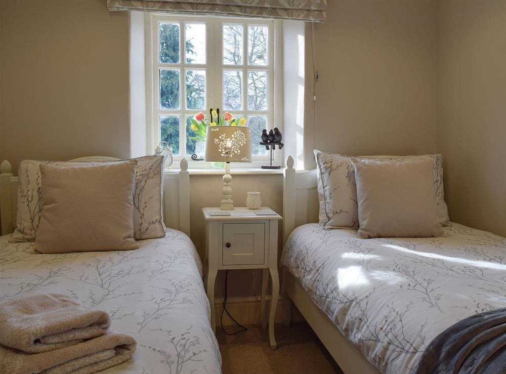 Twin bedroom at Spring Cottage in Bourton-on-the-Water, Gloucestershire