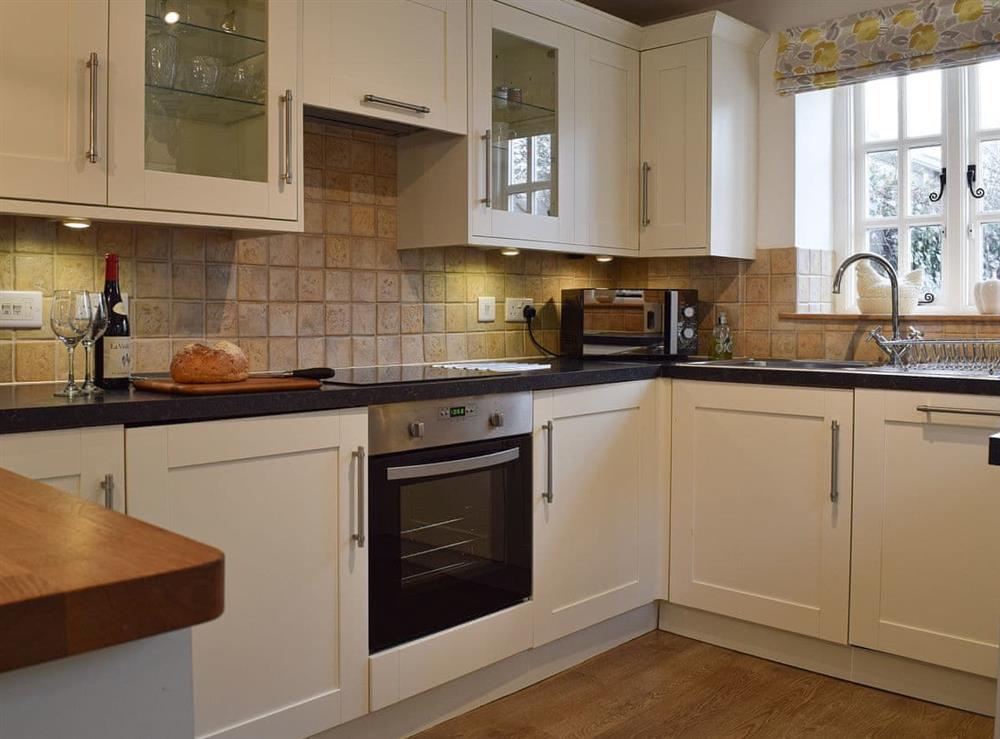 Well equipped kitchen at Spring Cottage in Bourton-on-the-Water, Gloucestershire