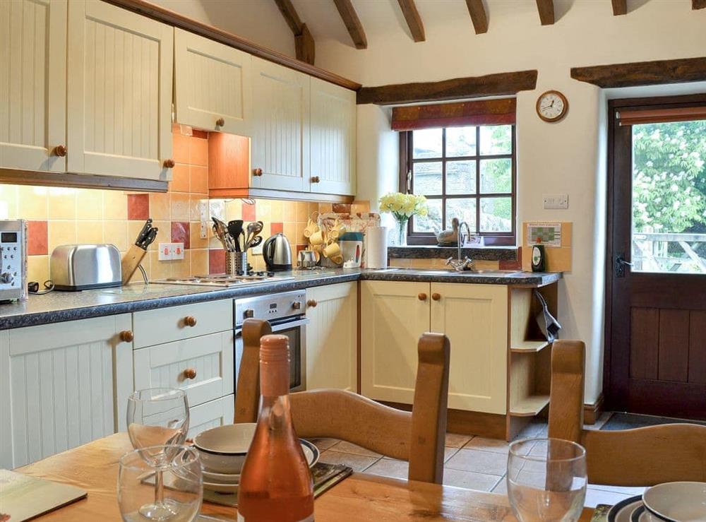 Well equipped kitchen/ dining room at Spring Cottage in Hollinsclough, near Buxton, Derbyshire