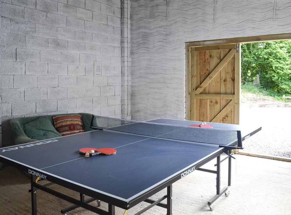 Games room with table tennis at Spring Cottage in Kentisbury, near Barnstaple, Devon