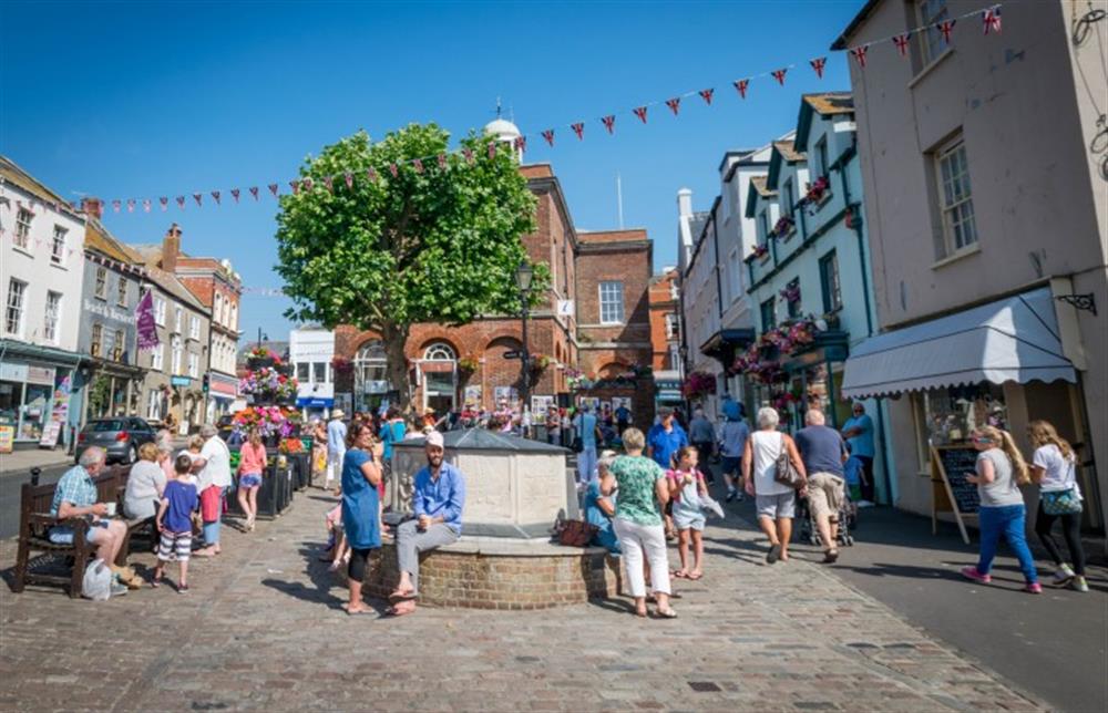 The bustling market town of Bridport is a short drive away