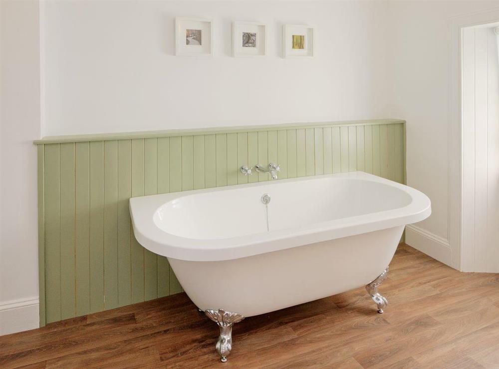 The bathroom features a standalone bath at Springbank in Taynuilt, near Oban, Argyll