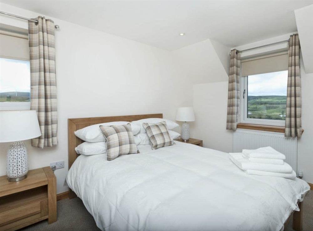 Tastefully furnished double bedroom with en-suite bathroom at Springbank in Upper Edinbane, near Portree, Isle Of Skye
