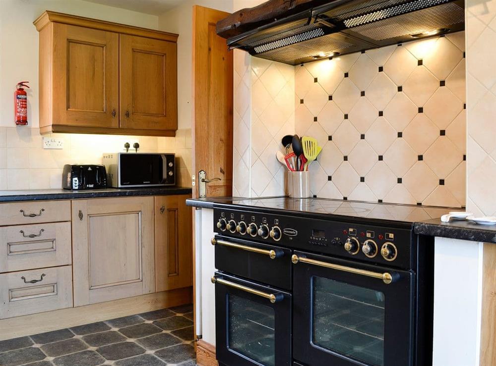 Kitchen with double range cooker at Farm Cottage, 