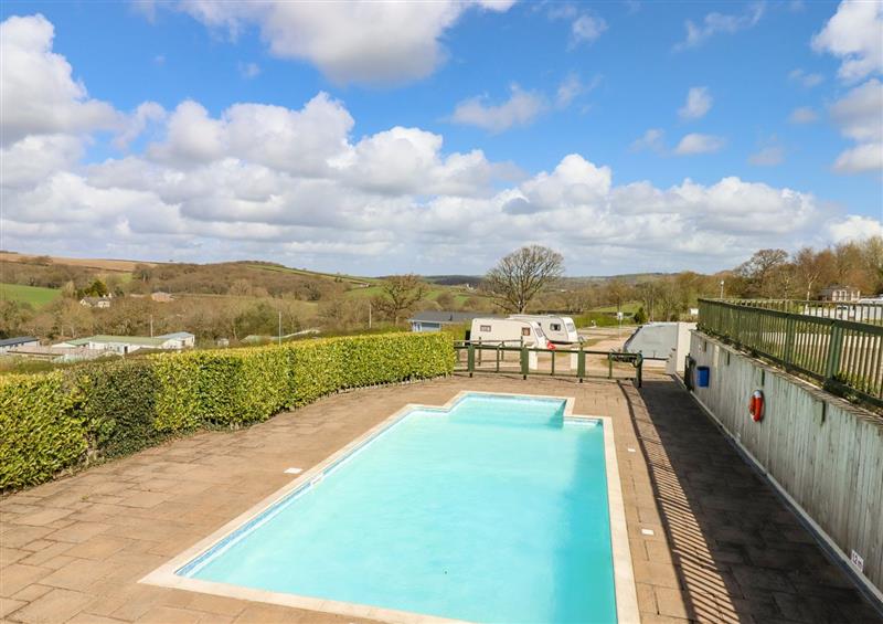 Spend some time in the pool at Springfield Lodge, Tedburn St Mary