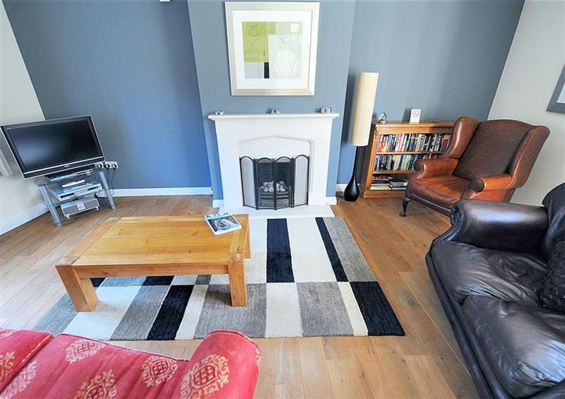 Relax in the living area at Springhill Cottage, Lyme Regis