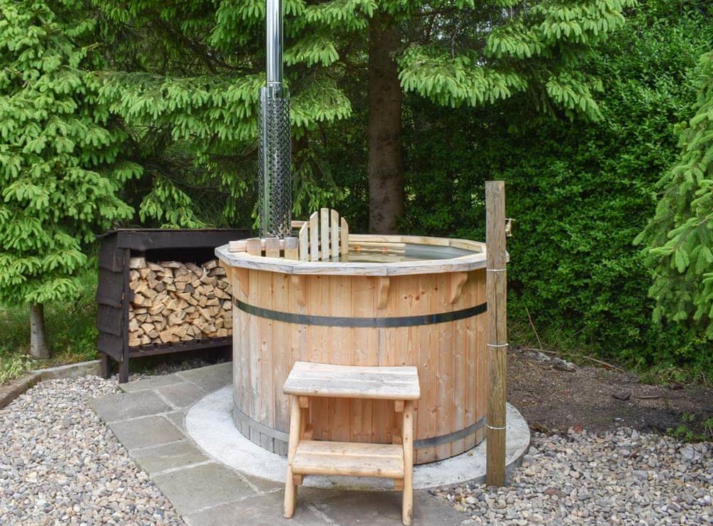 Hot tub at Spruce Shepherds Hut in Wilmslow, Cheshire