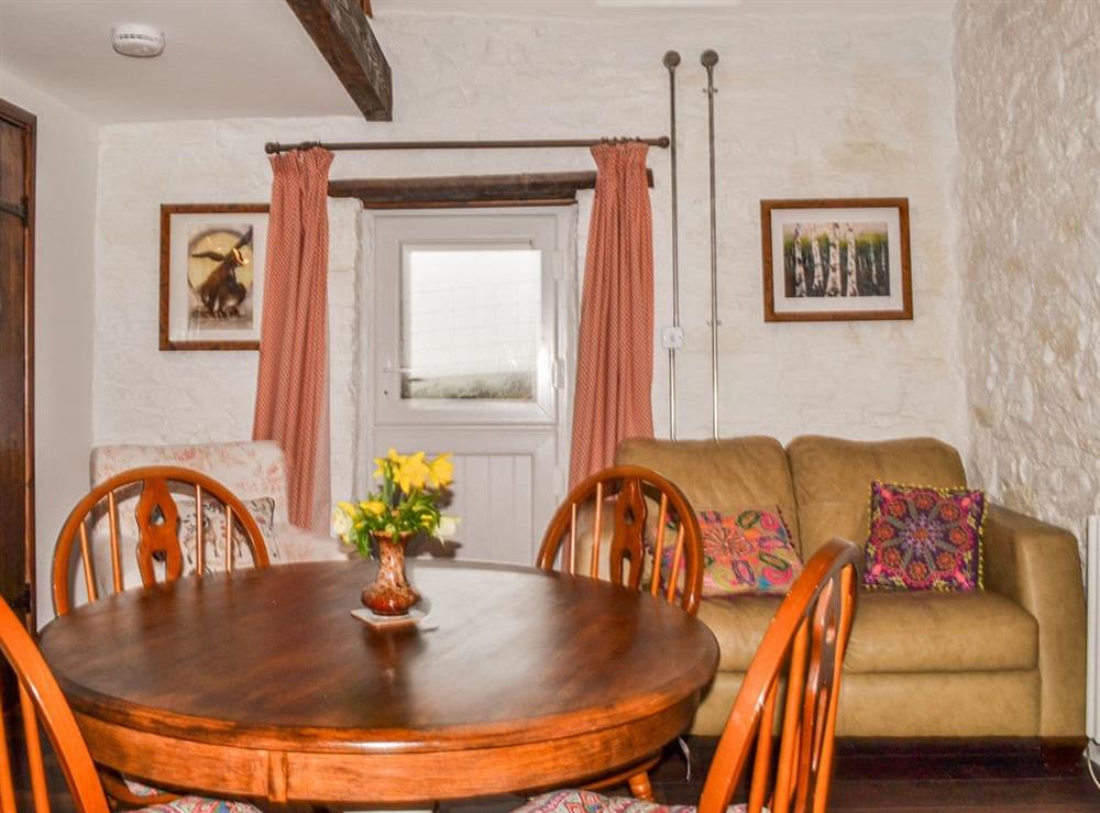 Living room/dining room at Spyte Cottage in Swansea, Glamorgan, West Glamorgan