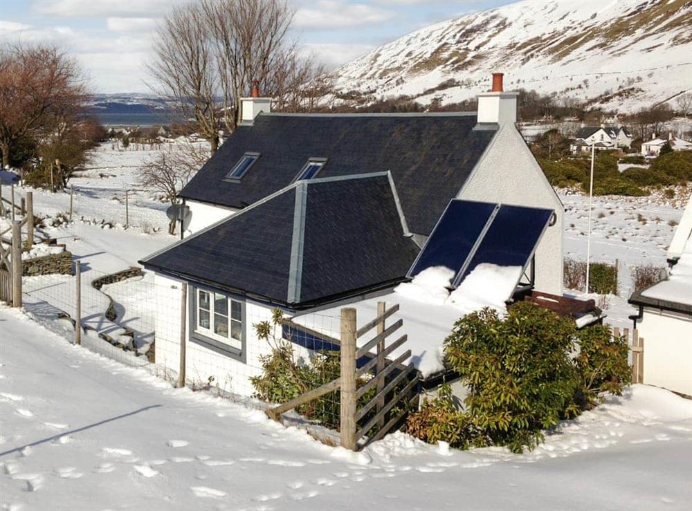 Exterior in winter snow (photo 2) at Sqlarran Cottage in Lochranza, Isle Of Arran