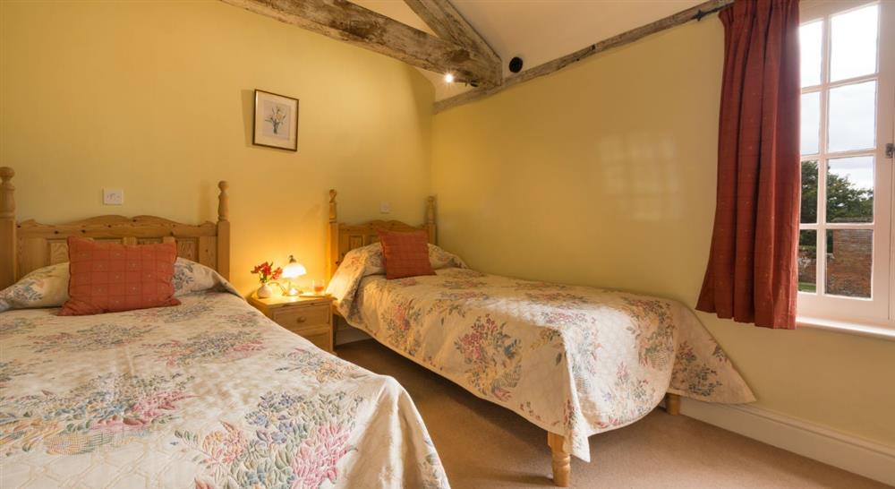 The spacious twin bedroom at Squire's Loft in Norwich, Norfolk