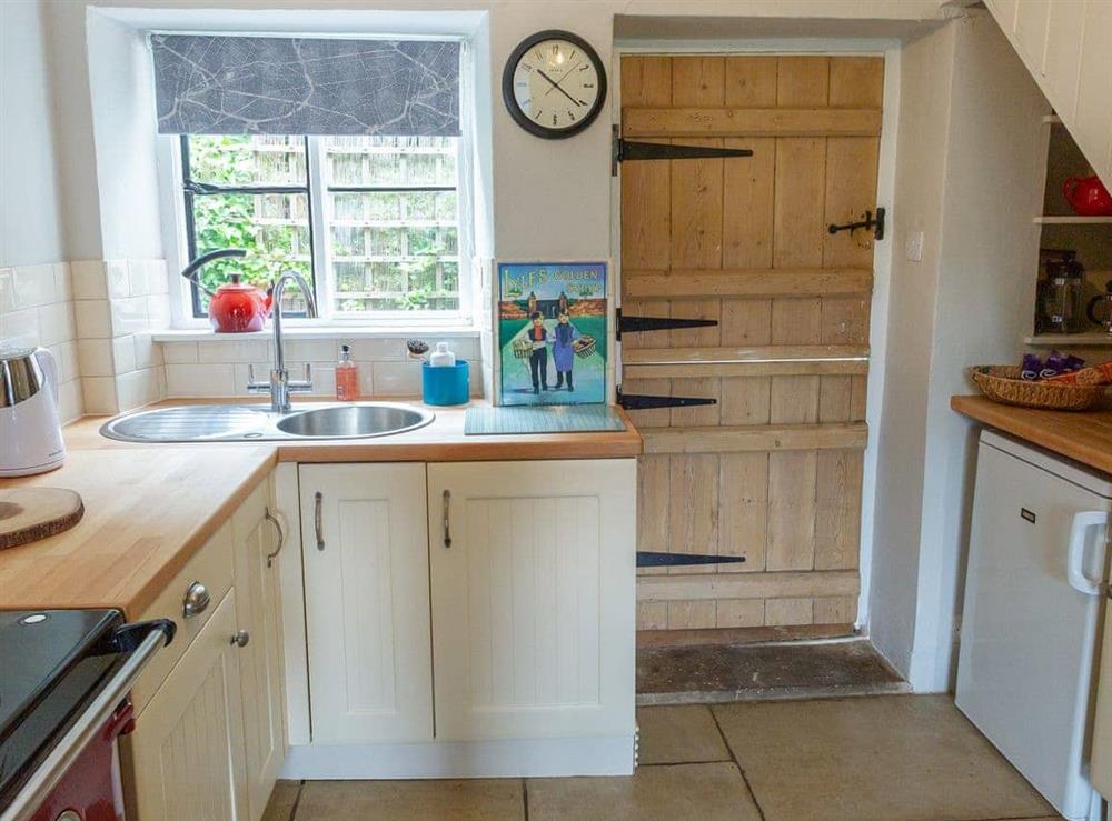 Compact corner kitchen area at Squirrel Cottage in Hook Norton, Nr Chipping Norton, Oxon., Oxfordshire