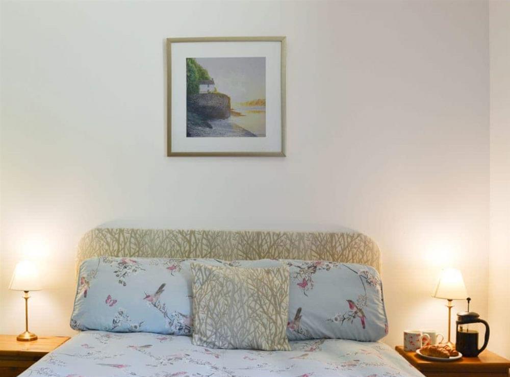 Cosy and inviting double bed at Squirrel Cottage in North Kessock, Inverness-Shire