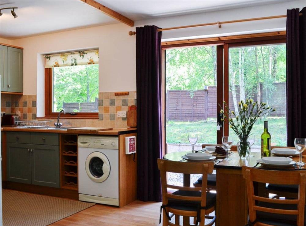 Spacious kitchen/dining area at Squirrel Cottage in North Kessock, Inverness-Shire