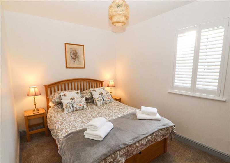 A bedroom in Squirrel Cottage at Squirrel Cottage, Penruddock near Ullswater