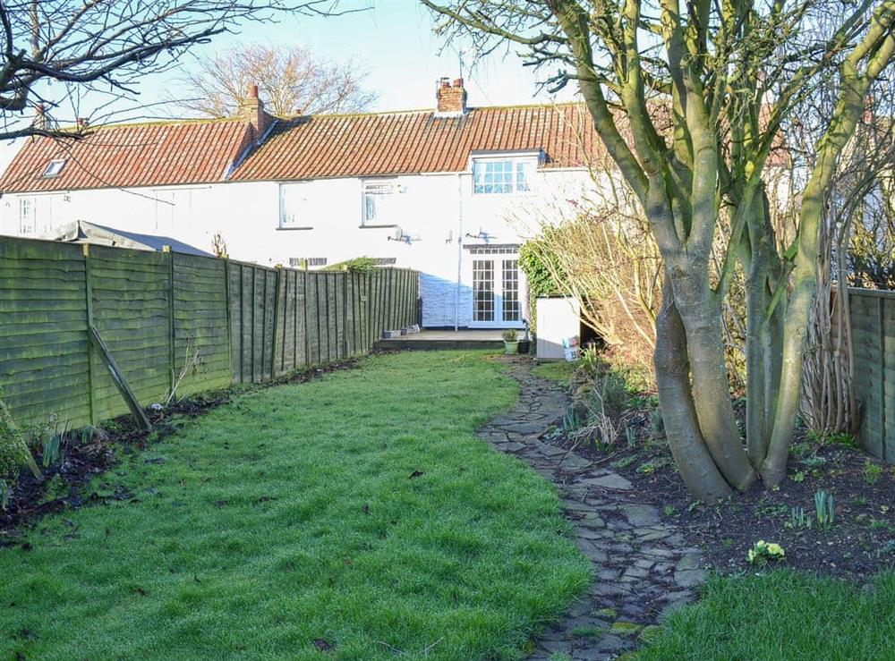 Sunny private garden at Squirrel Cottage in Seamer, near Scarborough, North Yorkshire