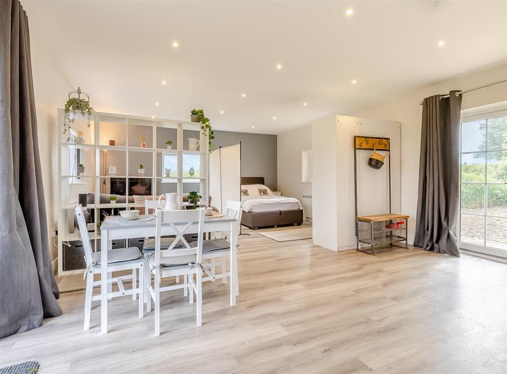 Open plan living space at Squirrel Lodge in Foxley, near Dereham, Norfolk