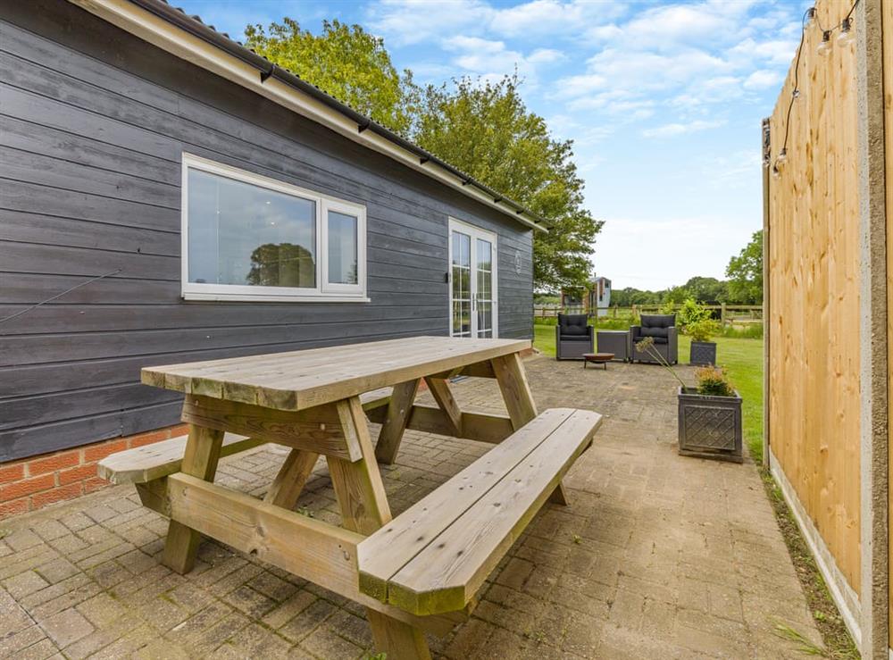 Sitting-out-area at Squirrel Lodge in Foxley, near Dereham, Norfolk