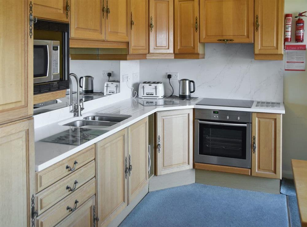 Well-equipped fitted kitchen at 12 Badgers Rake, 