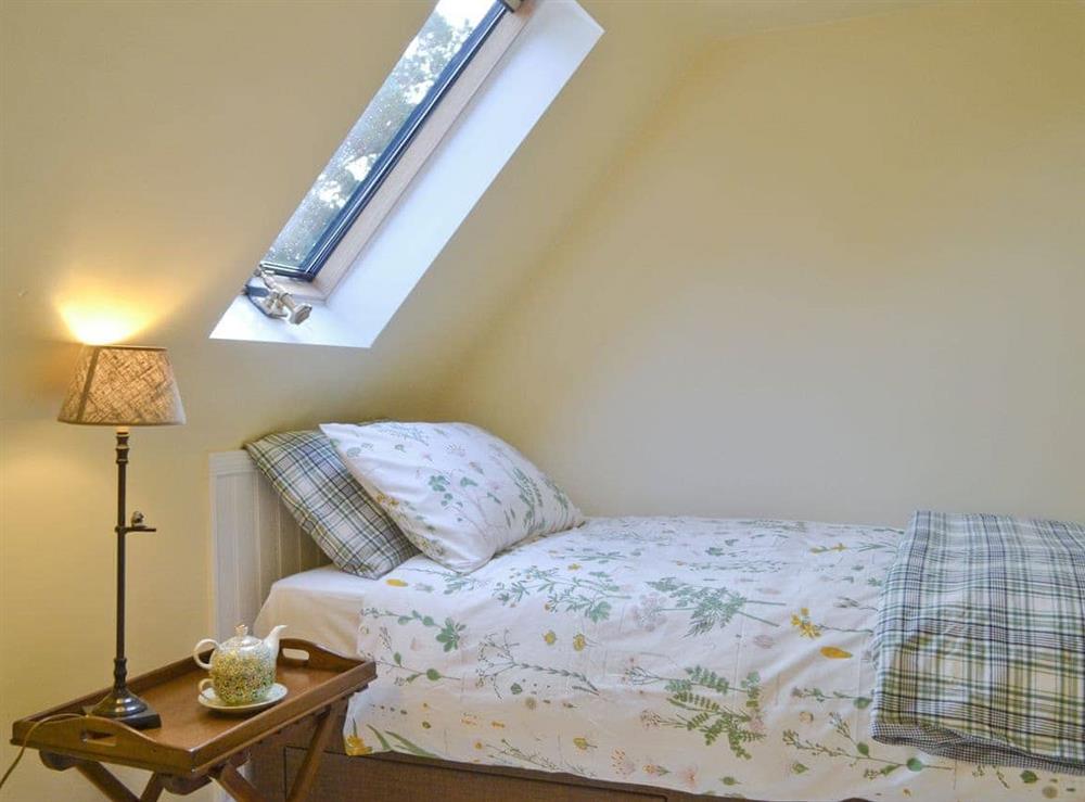 Single bedroom at Squirrels Tale Cottage in Dulnain Bridge, Morayshire
