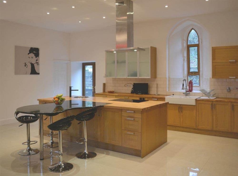 Open plan living/dining room/kitchen (photo 2) at St. Albans Church in Treherbert, near Treorchy, Mid Glamorgan