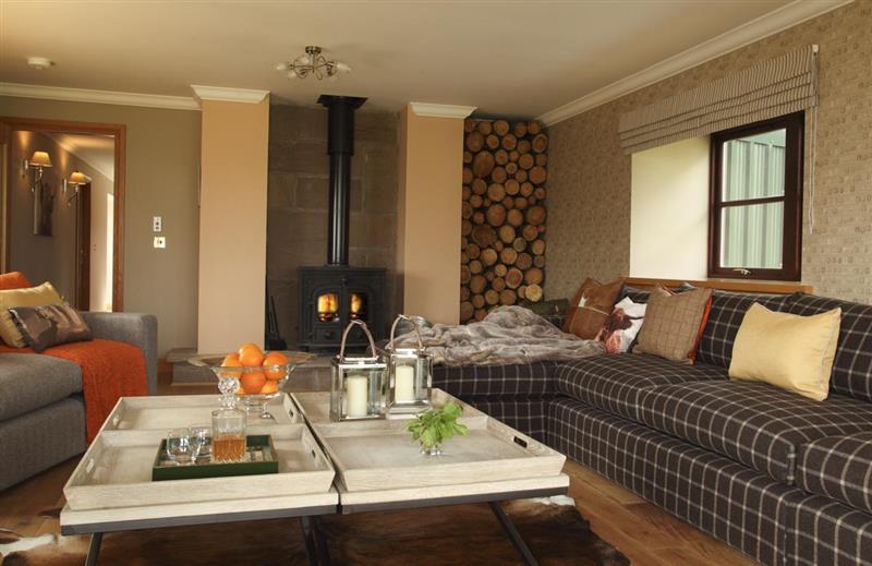 Living room and wood burning stove at St Andrews Country Retreat, Cupar, Fife