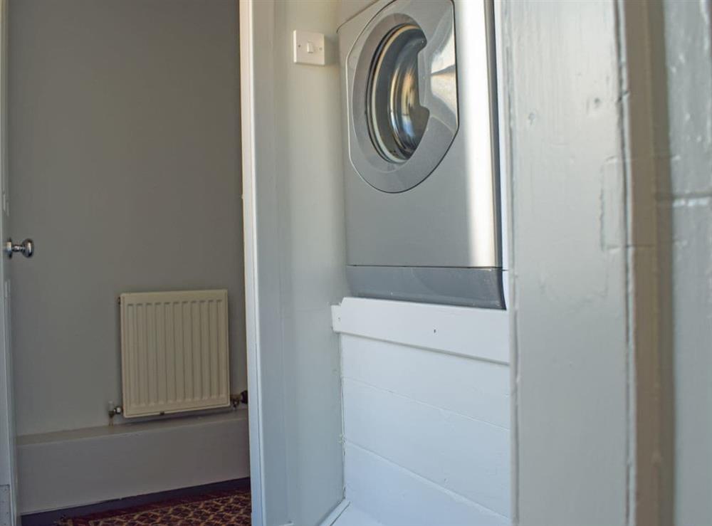 Utility room with washing machine and tumble dryer at St Andrews in Pittenweem, near Anstruther, Fife