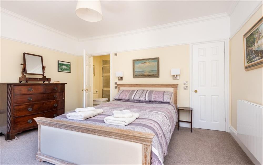 Master bedroom with super king size bed and en-suite at St. Brychan in Tintagel