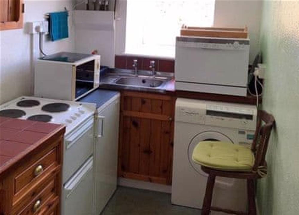 Compact and well equipped kitchen at St Catherines Court No 7 in Fowey, Cornwall