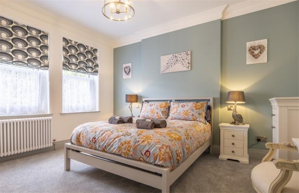 Bedroom two with King-size bed and en-suite at St Edmunds View, Hunstanton