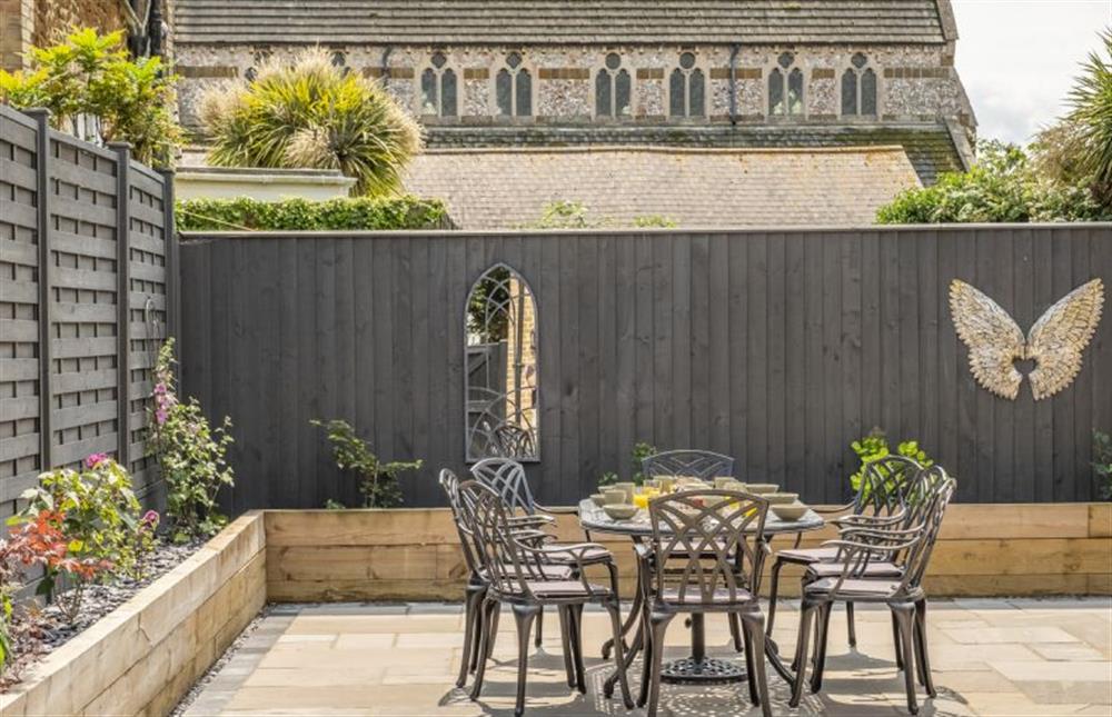 Enclosed courtyard with outdoor dining furniture and barbecue (photo 2) at St Edmunds View, Hunstanton