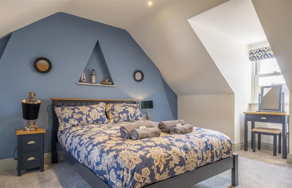 Master bedroom with Superking-sized bed and en-suite at St Edmunds View, Hunstanton