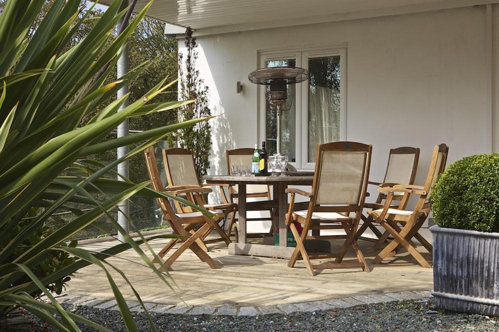 Front patio with garden furniture at St Elmo Lodge in Sandhills Road, Salcombe