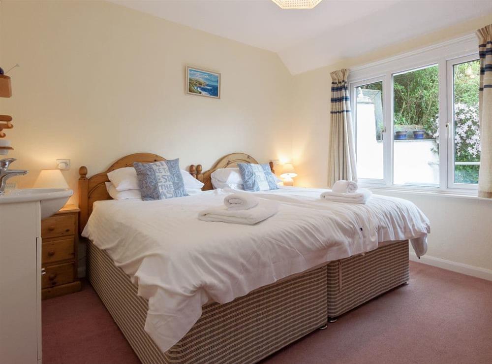 Well presented twin bedroom at Flat 1, 