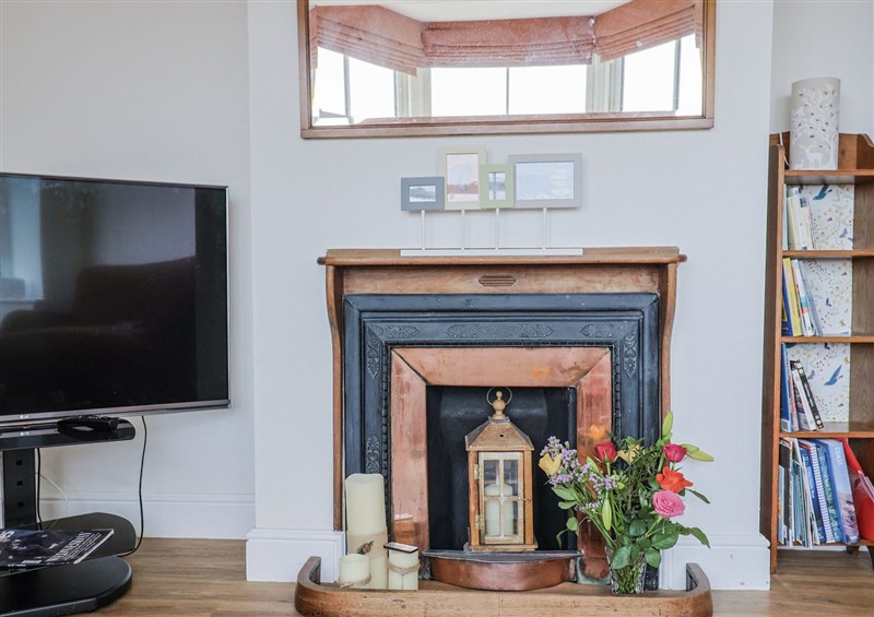 This is the living room (photo 3) at St Helena, Charmouth