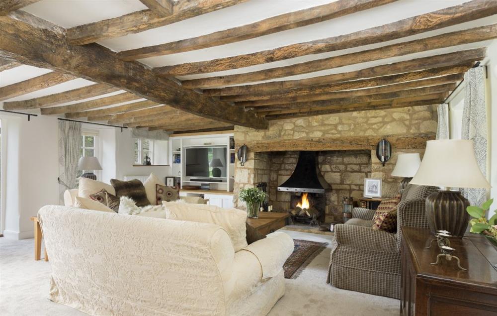 Ground floor: Beautifully proportioned sitting room with inglenook fireplace at St Michaels Cottage, Broadway