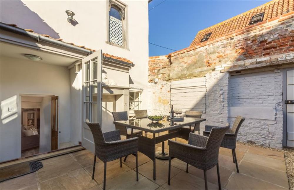 Enjoy the sunny south-facing fully-enclosed terrace at St Michaels Cottage, Wells-next-the-Sea