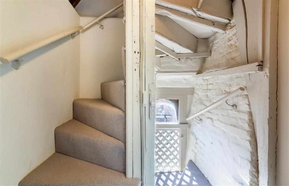 Second floor: Landing with stairs to third floor at St Michaels Cottage, Wells-next-the-Sea