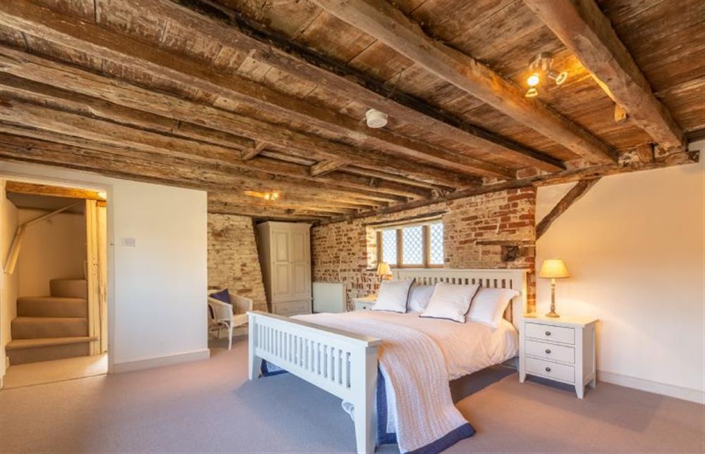 Second floor: Master bedroom which was formerly the old sail loft at St Michaels Cottage, Wells-next-the-Sea
