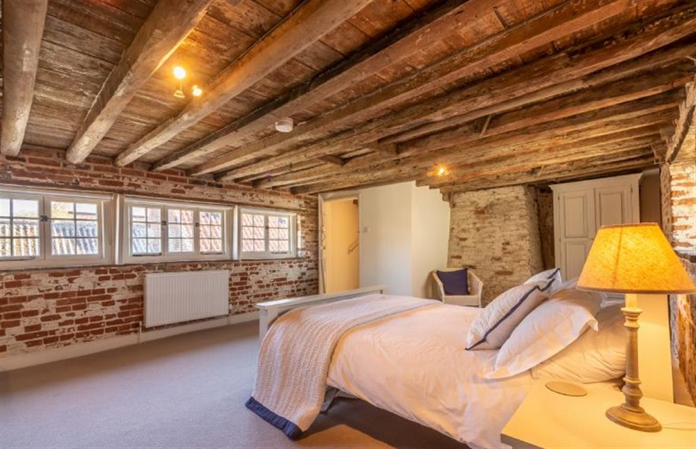 Second floor: Master bedroom with views to the front at St Michaels Cottage, Wells-next-the-Sea