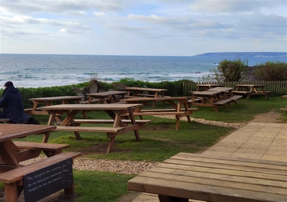 Perranuthnoe Beach is well-loved by surfers when the tide is in. There's a great cafe here overlooking the sea. at St Michaels Farmhouse in Penzance