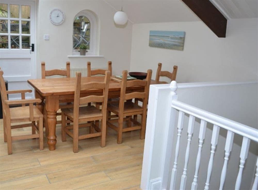 Dining area with large table seating up to 8 people at St Monicas in Fowey, Cornwall