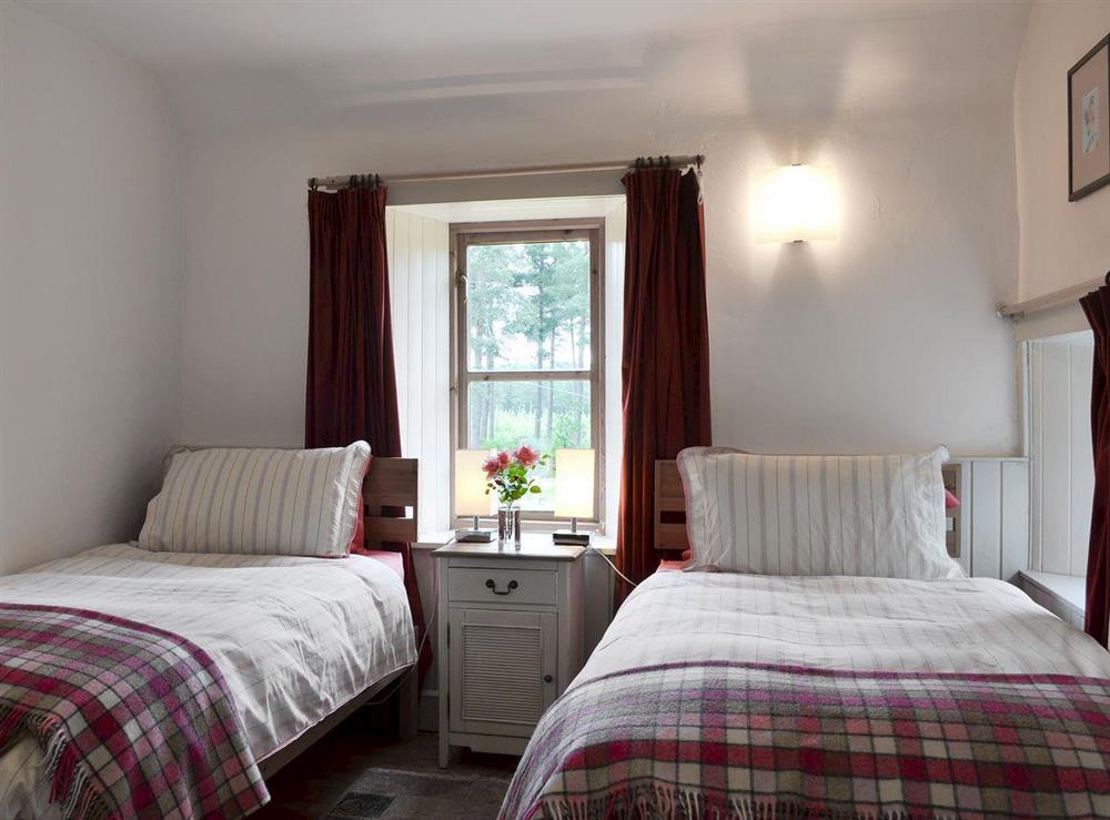 Cosy bedroom with twin beds at St Orans in Dunphail, near Forres, Highlands, Morayshire