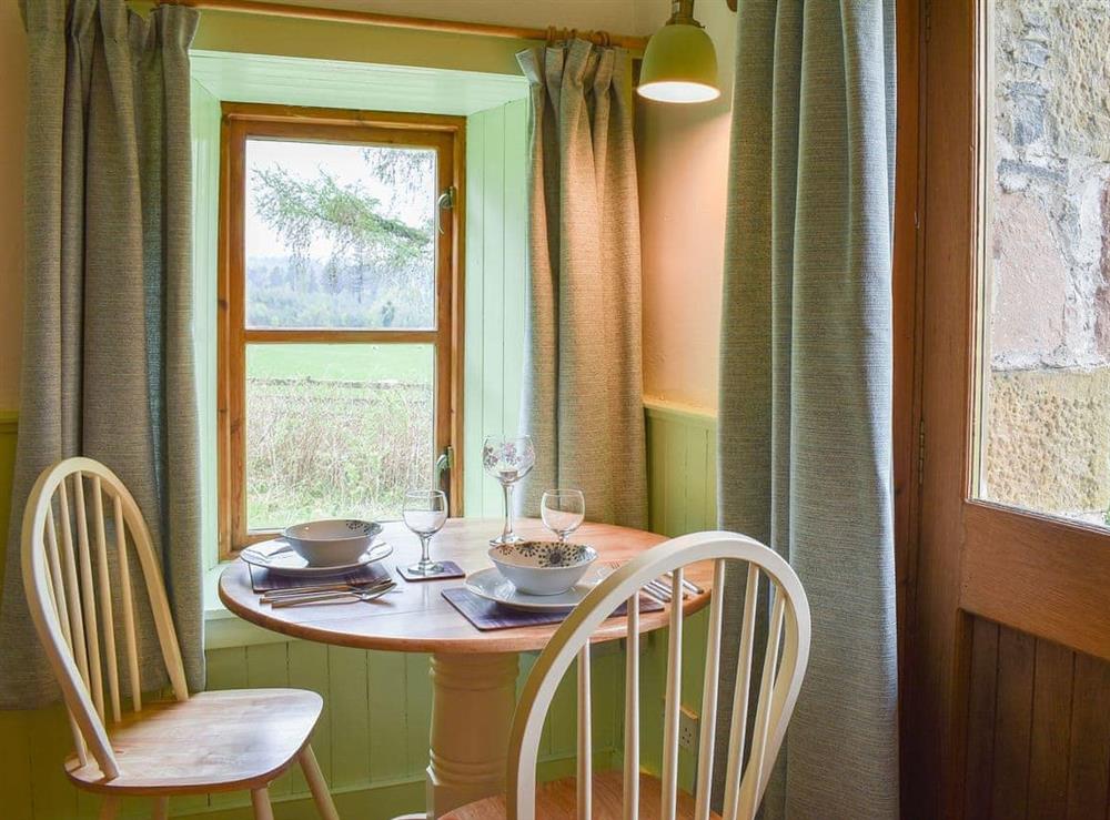 Modest dining area with garden view at St Orans in Dunphail, near Forres, Highlands, Morayshire