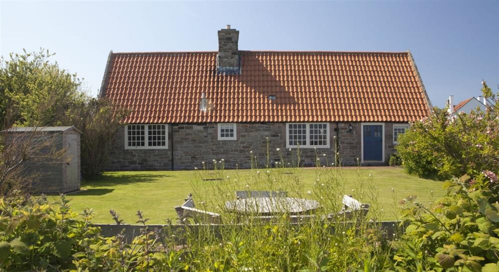 The exterior of St Oswald's Cottage, Holy Island, Northumberland