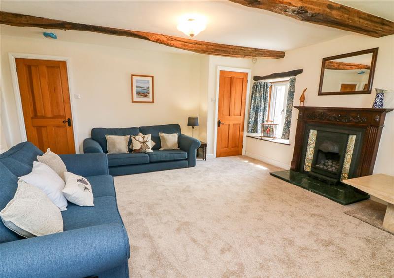Relax in the living area at St. Peters Cottage, Milnthorpe