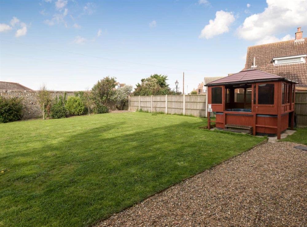 Hot tub & garden at St. Peters Court in Bacton, Norfolk