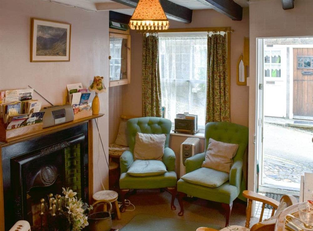 Cosy and quaint living/dining room/kitchen at St Robert’s Chantry in Robin Hoods Bay, near Whitby, North Yorkshire