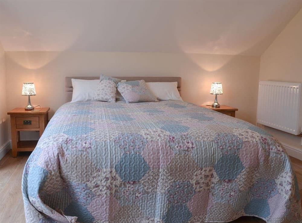 Double bedroom with balcony (photo 2) at Stabal Arthur in Bodedern near Holyhead, Gwynedd