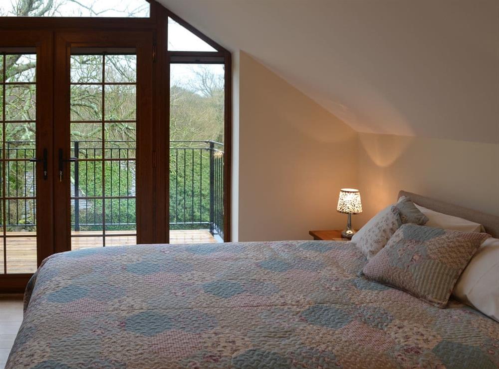 Double bedroom with balcony at Stabal Arthur in Bodedern near Holyhead, Gwynedd