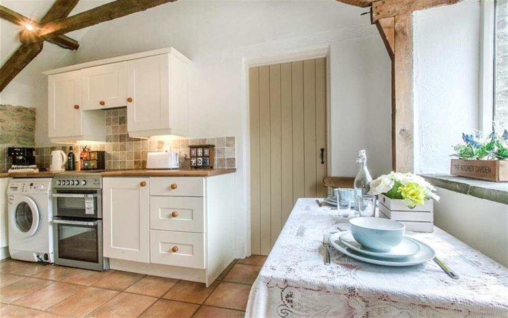 Dining for 2 in the cottage kitchen. at Stable Barn Cottage in East Prawle